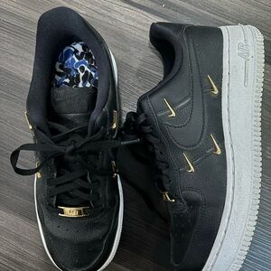 Nike Black and Gold Air Force 1 Sneakers